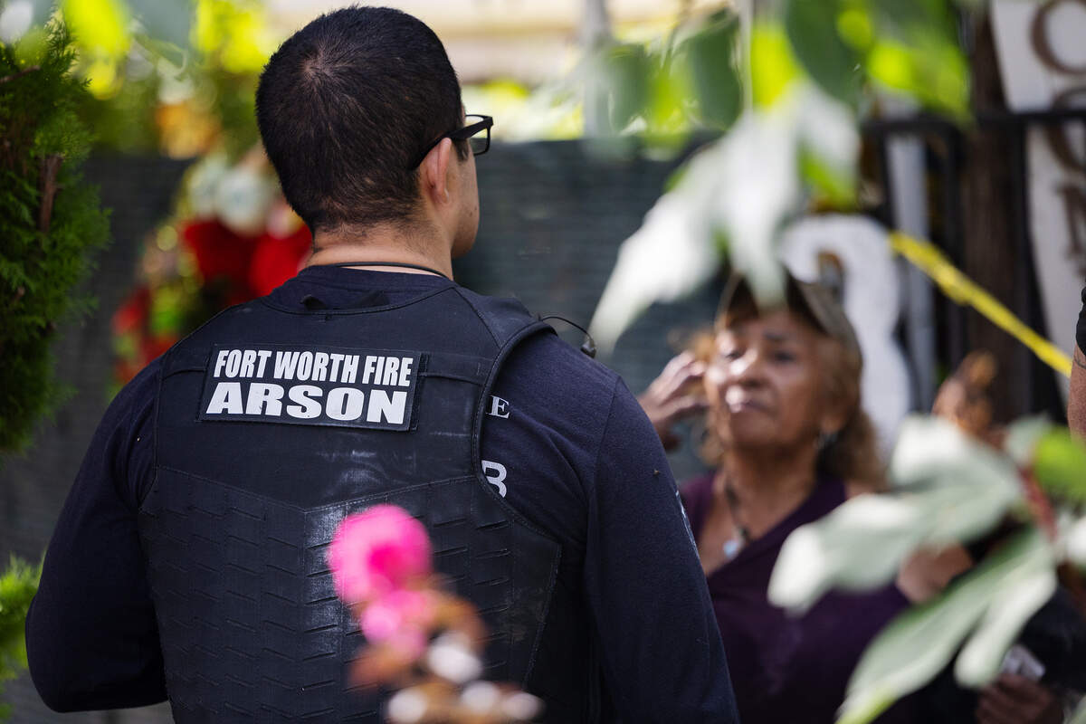 Officials investigate a fire in southeast Fort Worth that killed one person, critically injured another and sent two firefighters to the hospital early Thursday, July 16, 2026.